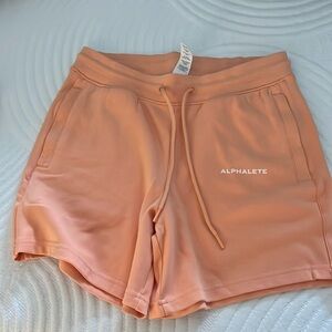 Alphalete athletic shorts peach color